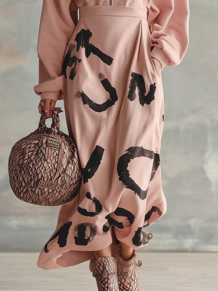 Pull à capuche rose à demi-zip avec imprimé streetwear tendance