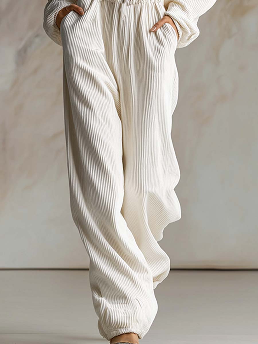 Combinaison décontractée en velours côtelé blanc avec capuche, fermeture éclair avant et manches longues