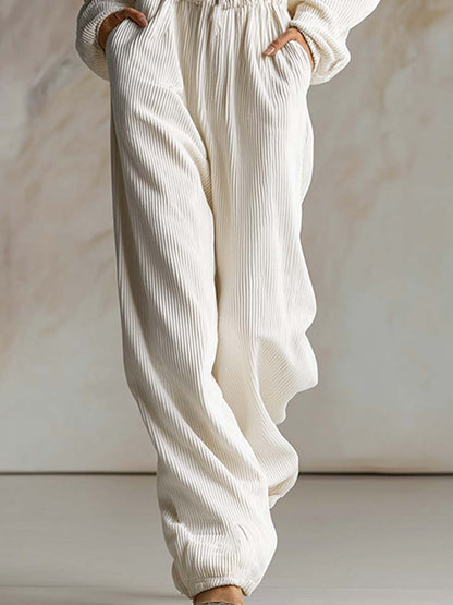 Combinaison décontractée en velours côtelé blanc avec capuche, fermeture éclair avant et manches longues