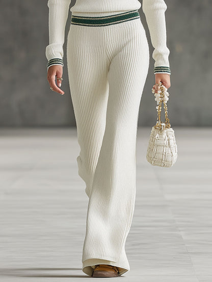 Ensemble Chic : Pull Zippé Blanc avec Bordure Dorée et Pantalons Évasés