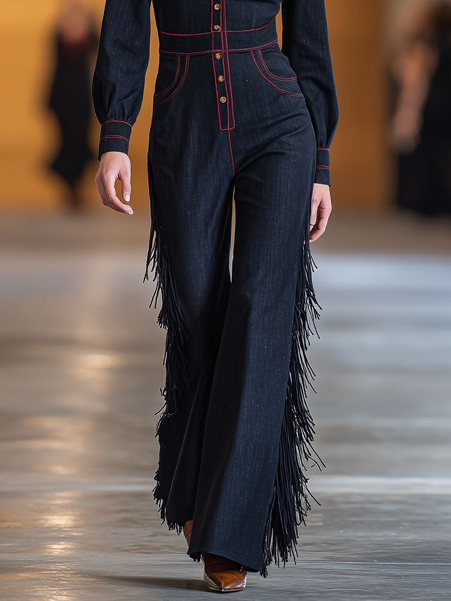 Combinaison en denim bleu marine à manches longues et évasées, ornée de surpiqûres rouges vintage