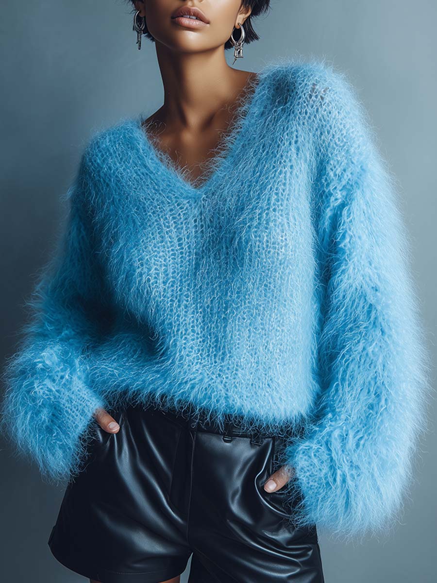 Léger pull en laine tricoté bleu clair avec col en V décontracté