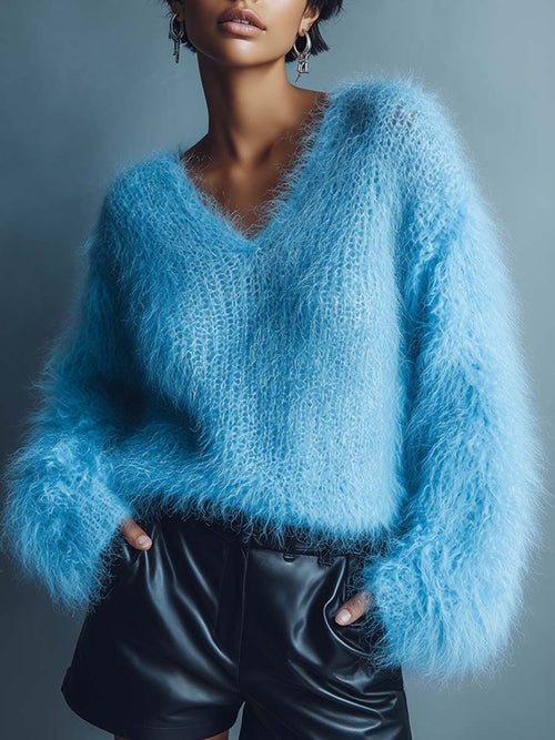 Léger pull en laine tricoté bleu clair avec col en V décontracté